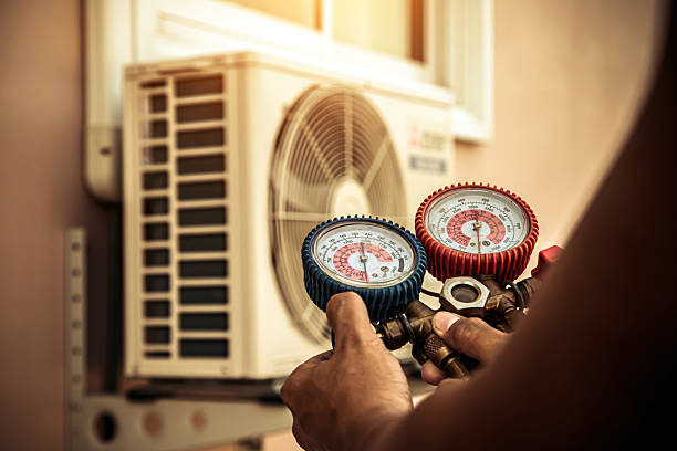 Professional Heat Pump Repair technician working in Grass Creek, IN
